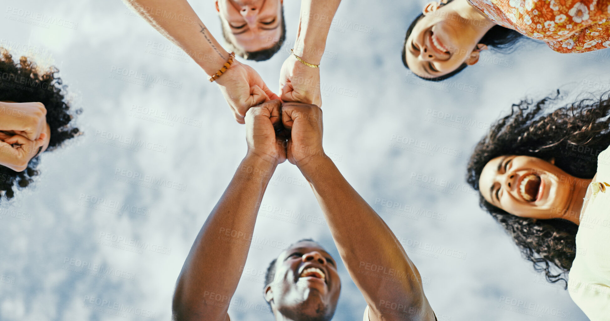 Buy stock photo Below, fist bump and friends with huddle, vacation and travel with summer holiday. Low angle, people and men with women, outdoor and partnership with fun, weekend break or reunion with bonding