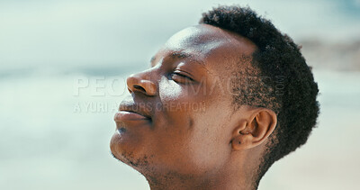 Buy stock photo Black man, peace and breathing to relax with fresh air at beach for break, tranquility or natural oxygen. Calm, profile or person on holiday at ocean coast for vacation mockup or outdoor meditation