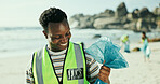 Happy man, volunteer and cleaning beach with bag for recycling, eco friendly environment or earth day. Male person, activist or community service with smile or dirt for save planet or world charity