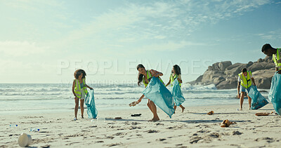 Buy stock photo People, group and plastic bag for cleaning beach with social responsibility, outdoor or earth day with environment. Women, men and volunteer team by sea for accountability with trash, garbage or dirt