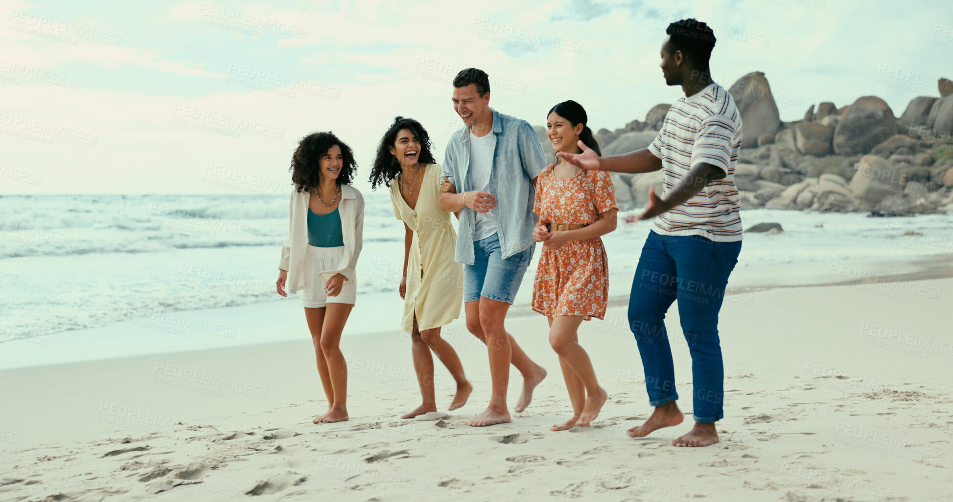 Buy stock photo Beach, bonding and smile with friends walking on sand together for holiday, travel or vacation. Diversity, laughing and weekend with group of happy people outdoor on tropical island paradise