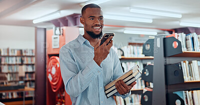 Buy stock photo Man, phone and books with recording at library with voice notes, contact or happy with studying at college. African person, university student and smile for memo, reminder or scholarship for learning