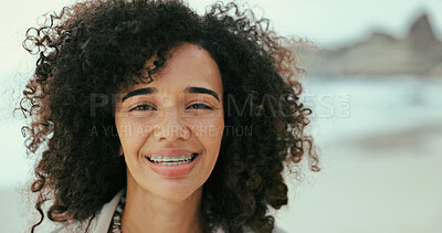 Buy stock photo Portrait, travel and happy woman at ocean for vacation, holiday and relax outdoor for adventure. Beach, face and African person in nature at sea for summer trip on tropical on island in Mauritius