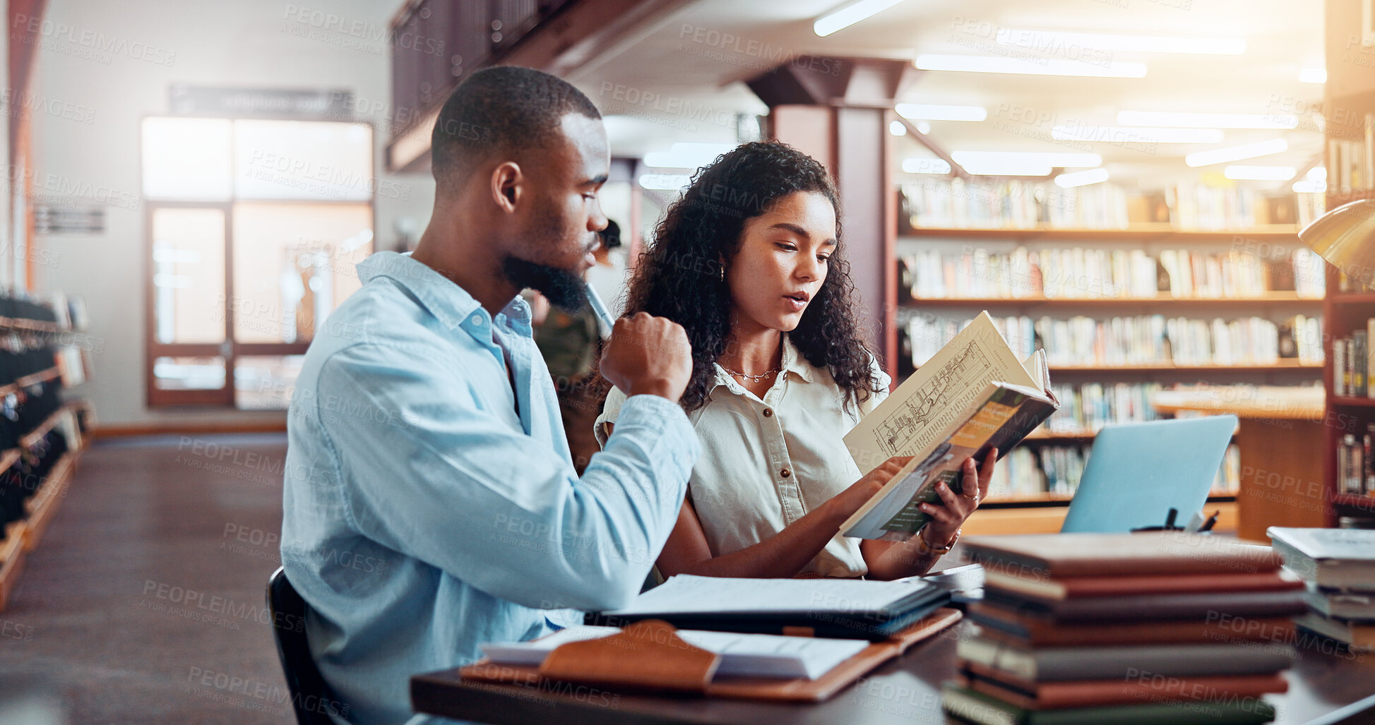 Buy stock photo University, books and people in library reading for online research, information and studying for project. College, students and man and woman with laptop for education, knowledge and learning