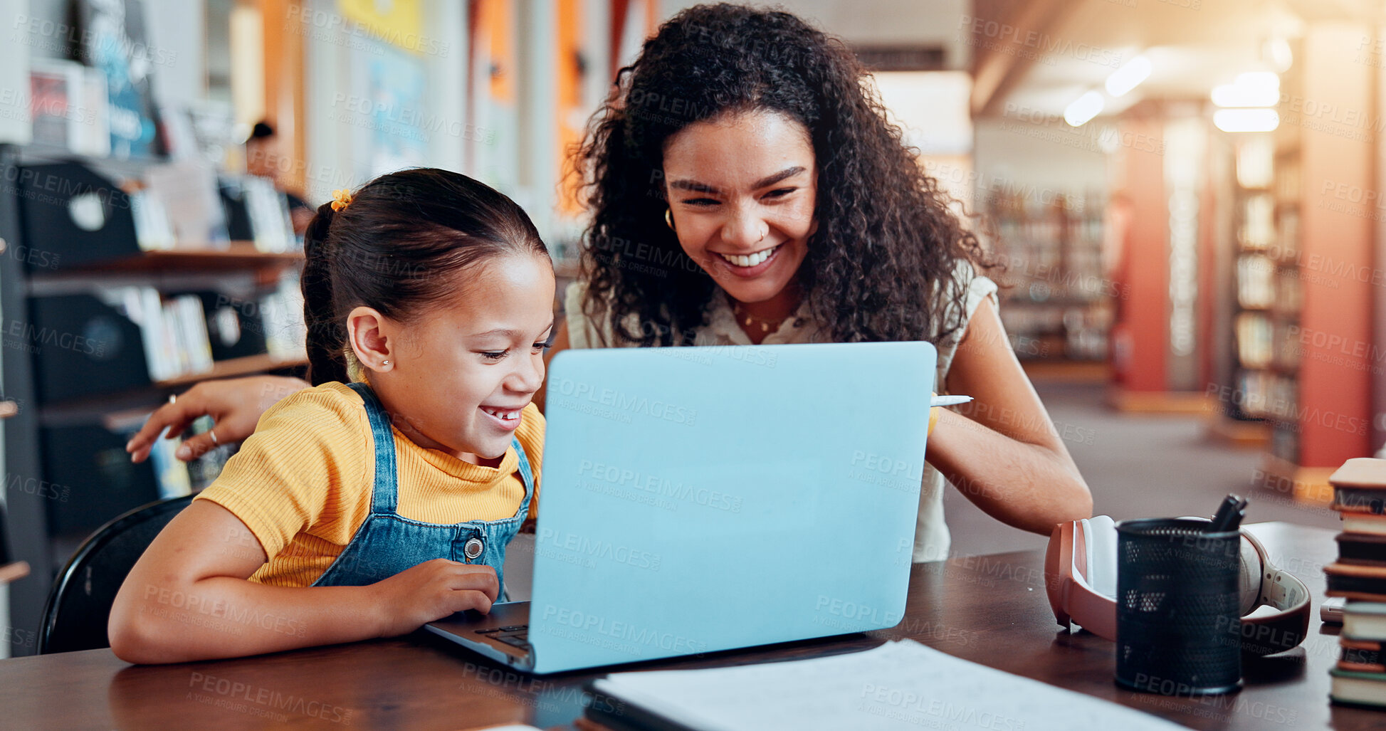 Buy stock photo Girl, mom and happy with laptop at library with e learning, support and guide for development with test. People, mother and daughter by computer, scholarship and excited for results with education