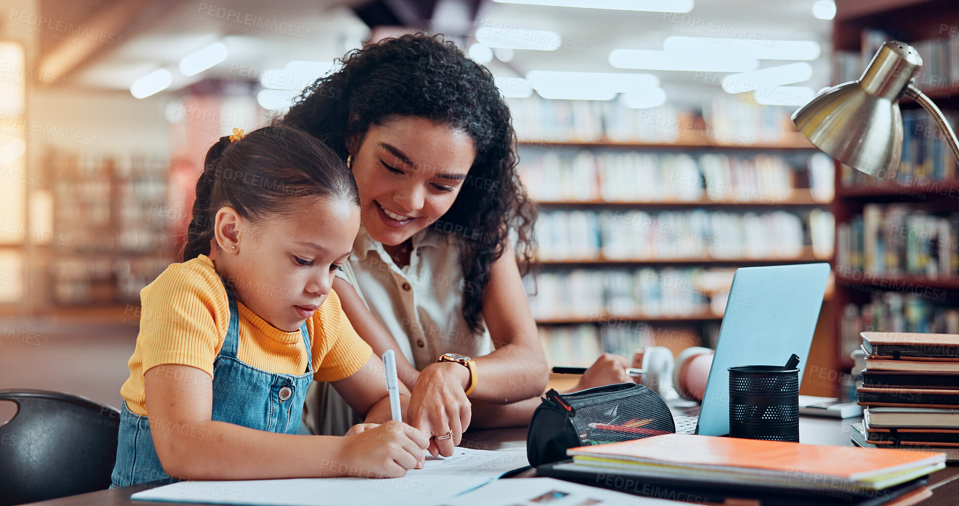 Buy stock photo Mom, girl and learning with writing at library with smile, notes and support for assessment, development or reading. Child, mother and daughter with pc, book or guide with education for scholarship