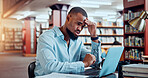 Black man, laptop and headache in library for education, research or project deadline for university student. African person, stress and anxiety with pain on campus for overtime, burnout and report