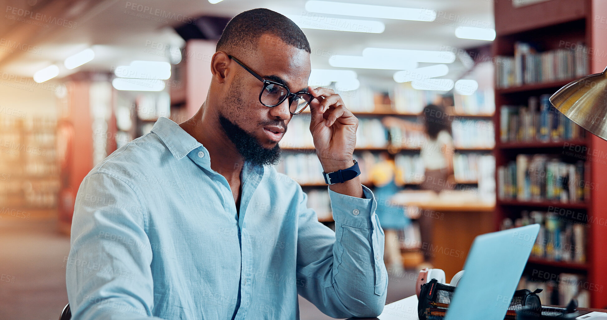 Buy stock photo Student, laptop and black man in library, thinking and education with research for assignment. Person, academic growth and phd candidate with computer, planning and problem solving with website info