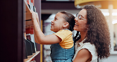 Buy stock photo Bookshelf, mother and girl with support, smile and bonding together with hobby, education and knowledge. Family, parent and mama with daughter, literacy and love with options, decision and learning