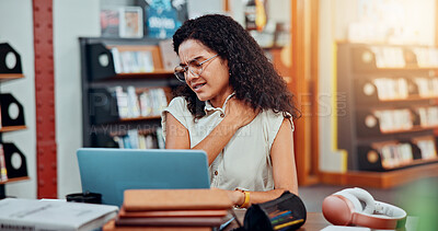 Buy stock photo Woman, laptop and neck pain in library for education, research or project deadline for university student. Female person, stress and anxiety with strain on campus for overtime, burnout or report
