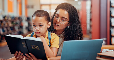 Buy stock photo Mom, girl and bible with reading at library with faith, God and support for education, development and religion. Child, mother and daughter with scripture, book and Christian literature for learning