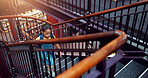Child, girl and stairs in library for education, student walking for learning and knowledge at academy campus. Scholarship, growth and development, story time in bookshop or literacy study at school