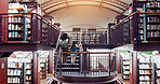 Tutor, girl and library stairs with study for information, learning or knowledge for academic woman. Book session, student development and education with teacher, scholarship and walking people