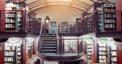 Buy stock photo Woman, girl and library stairs with walk for information, learning or knowledge for academic tutor. Book session, student development and education with mother, scholarship and people for study
