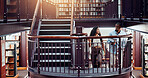 University, students and library stairs with study for information, learning or knowledge for academic citation. Book session, friends and education with research, scholarship and walking people