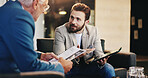 Collaboration, meeting and tablet with business men in lobby of office for discussion or proposal. Documents, smile and presentation with employee in workplace for partnership, report or research