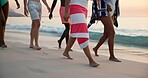 Legs, group and people walk on beach for summer vacation, tropical journey and travel weekend. Feet, friends and trip on island for social gathering, ocean adventure and reunion with getaway holiday