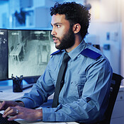 Securityman Photopc Security, computer and man in control room for surveillance ...