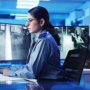 Security, computer and woman on monitor in control room for ...