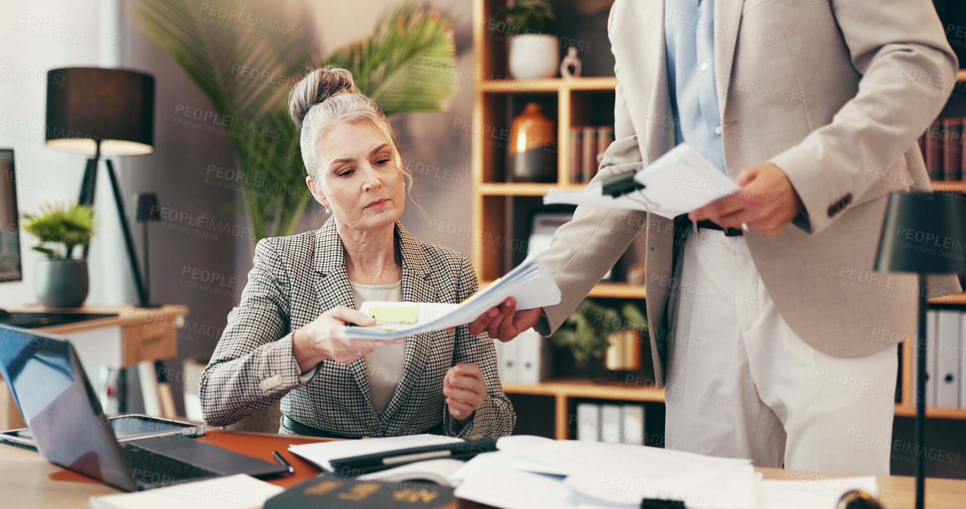 Buy stock photo Woman, lawyer and meeting with documents in office for legal consulting, review contact and company case. Mature client, attorney and paperwork for settlement, information and procedure of management