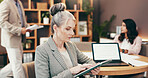 Professional, tablet and mature woman in office for research, online budget review and finance proposal. Business, accountant and person on digital tech for website, financial consultant and planning