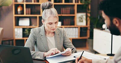 Buy stock photo Business, people and reading documents in office for legal consulting, information and review case. Mature woman, attorney and paperwork with settlement, company contract and procedure for management