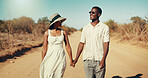 Couple, happy and holding hands on safari, path and connection with love for romance on holiday in summer. African man, woman and smile on dirt road, bonding and anniversary on vacation in Kenya