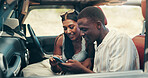 Couple, phone and road trip in car, happy and check direction for location, journey and vacation. People, man and woman on smartphone, smile and mobile app with map for travel with vehicle on holiday