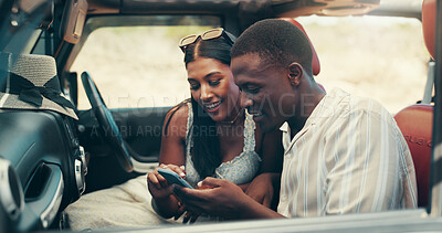 Buy stock photo Couple, phone and road trip in car, happy and check direction for location, journey and vacation. People, man and woman on smartphone, smile and mobile app with map for travel with vehicle on holiday