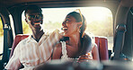 Happy couple, hug and relax in car for road trip, bonding or relationship travel. Interracial people, love or excited on journey for vacation, summer holiday or countryside with laugh in conversation