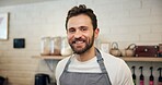 Happy, waiter and portrait of man in coffee shop for espresso machine, barista and small business manager. Restaurant, cafeteria and hospitality with person in cafe for server, smile and about us