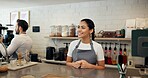 Happy woman, barista or cafe with counter for small business, order or customer service. Female person, bistro or friendly employee with smile for hospitality, welcome or serving table at coffee shop