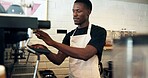 Barista, machine and man with coffee preparation in cafe for customer order, premium caffeine or brewing process. Hospitality, black person and espresso beverage blend for restaurant service or latte