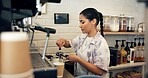 Barista, machine or woman with grind tool in cafe for coffee preparation, premium caffeine blend or brewing process. Hospitality industry, server or espresso drink order for customer service or latte