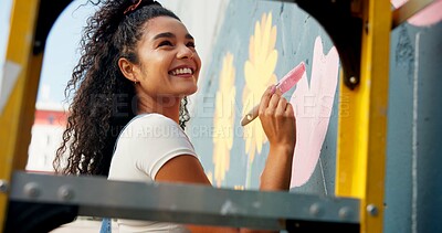 Buy stock photo Happy, mural and woman painting wall for art design, creative project and community service. Artist, volunteer and person with paintbrush outdoor for flower decor, inspiration and DIY hobby in city