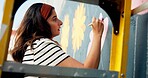 Painting, mural and woman with wall for art design, creative project and community service. Artist, volunteer and person with paintbrush outdoor for flower decor, inspiration and DIY hobby in city