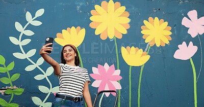Buy stock photo Selfie, painting and smile with woman and wall for flower mural, earth day promotion and eco artist. Sustainability project, environment activist and photography with person and biodegradable painter