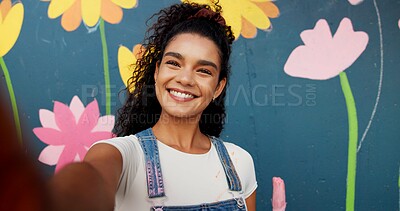 Buy stock photo Selfie, painting and wall with portrait of woman for flower mural, earth day promotion or eco artist. Urban project, environment activist and photography with person in city and biodegradable painter