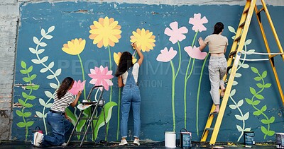Buy stock photo Wall art, women and painting mural outdoor for sustainable awareness, community project or creative teamwork. Flower decoration, people and floral inspiration for DIY public design, earth day or back