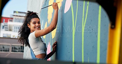 Buy stock photo Painting, portrait and woman with wall mural for art design, creative project and community service. Artist, happy and person with paintbrush for flower decor, inspiration and DIY hobby in city