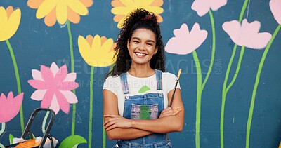 Buy stock photo Mural, creative and woman with arms crossed, portrait and proud of decoration for wall and artist. Happy, painter and confidence for design in neighbourhood, outdoor and community project in USA