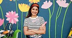 Mural, smile and woman with arms crossed, painting and proud of decoration for wall art and outdoor. Creative, painter and confidence for design in neighbourhood, happy or community project in Canada