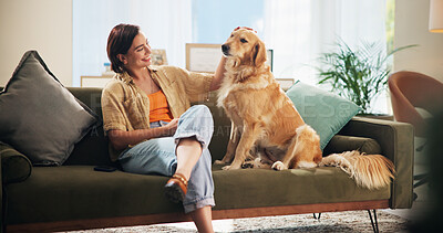 Buy stock photo Home, happy and woman with dog on sofa for bonding, relaxing and chill together in living room. Best friend, pet and person with Golden Retriever on couch for animal care, love and fun on weekend