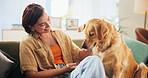 Woman, golden retriever and play on couch in home, smile and bonding in morning for love in living room. Excited girl, dog mom and pet animal with embrace, happy and loyalty with touch at apartment