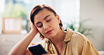 Woman, phone and relax on sofa in home with click, notification or texting in living room. Person, smartphone and contact with chat on mobile app, social media and scroll with web on couch at house