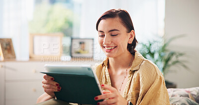 Buy stock photo Woman, happy and tablet on sofa, relax and streaming with funny video in living room at apartment. Girl, person and digital touchscreen with app, movie subscription and smile for social media in home