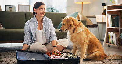 Buy stock photo Suitcase, clothes and woman with dog in home packing for travel, holiday and international vacation. Animal, pet and happy person with Golden Retriever on floor with luggage to prepare for trip