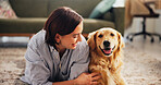 Love, bonding and dog with woman on floor of living room for petting, relax and loyalty. Trust, animal adoption and care with person and golden retriever at home for support, domestic and happiness