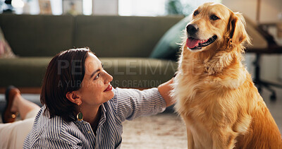 Buy stock photo Love, petting and dog with woman on floor of living room for relax, bonding and loyalty. Trust, animal adoption and care with person and golden retriever at home for support, domestic and happiness
