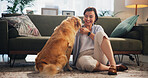 Smile, relax and dog with woman on floor of living room for petting, bonding and loyalty. Trust, animal adoption and care with person and golden retriever at home for support, domestic and happiness